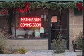 <b>Easily Create a Custom Sign</b><br>By using a SpellBrite sign to announce it is “COMING SOON” and illuminating it 24/7, a retailer can build greater interest and demand to meet before it opens.<br><i>(SpellBrite Red letters used – the intense brightness of the red letters can make them look white or orange in photos.)</i>